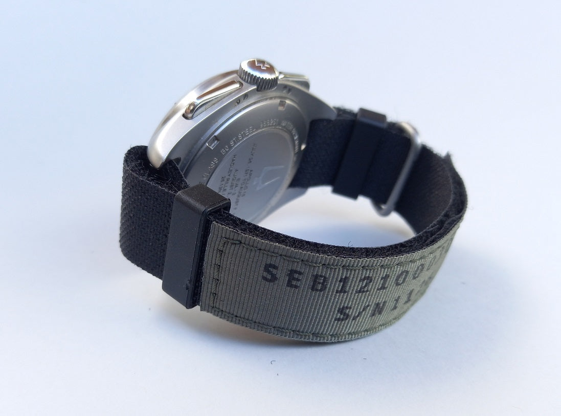 Short NASA watch strap (latest mil-spec) - P/N SEB12100030-210 on Apollo 15 astronaut Charlie Duke's grey/green Olive Drab- Kizzi Precision Flightgear